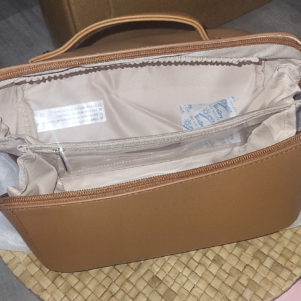 New, Chic Tan Cosmetic Bag.
